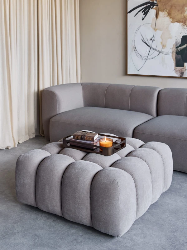 Marylebone large pouffe 100 cm upholstered in cream velvet – a stylish and practical dressing room pouffe for elegant interiors.