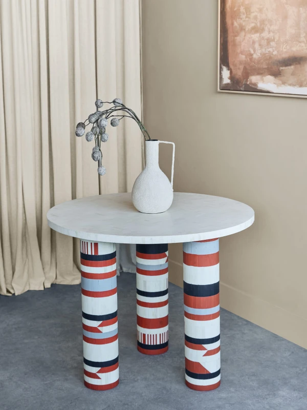 Coco round dining table 90 cm with colourful bone inlay. Stylish designer table for modern dining rooms.