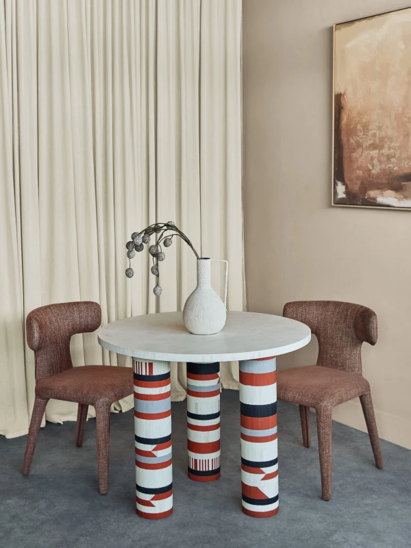 Coco round dining table 90 cm with colourful bone inlay. Stylish designer table for modern dining rooms.