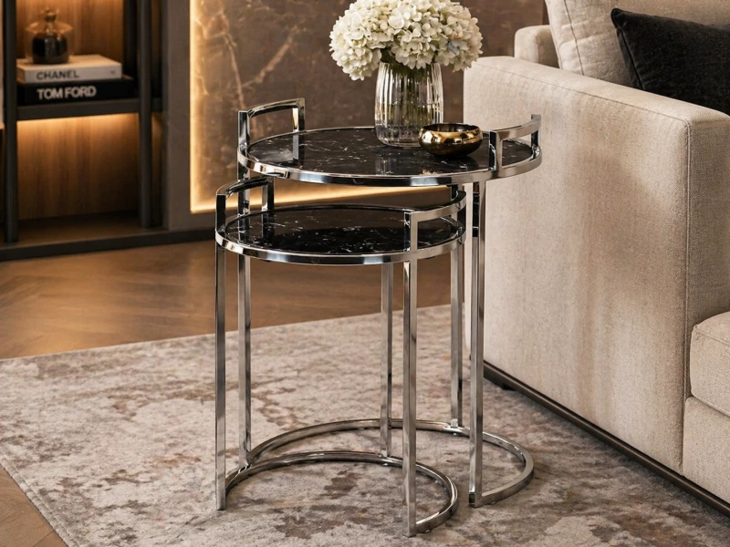 Set of black stone top side tables with silver stainless steel frames