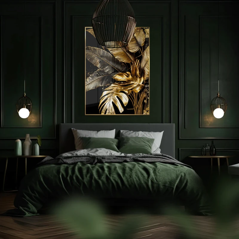 Black and gold tropical leaf wall art in a gold frame