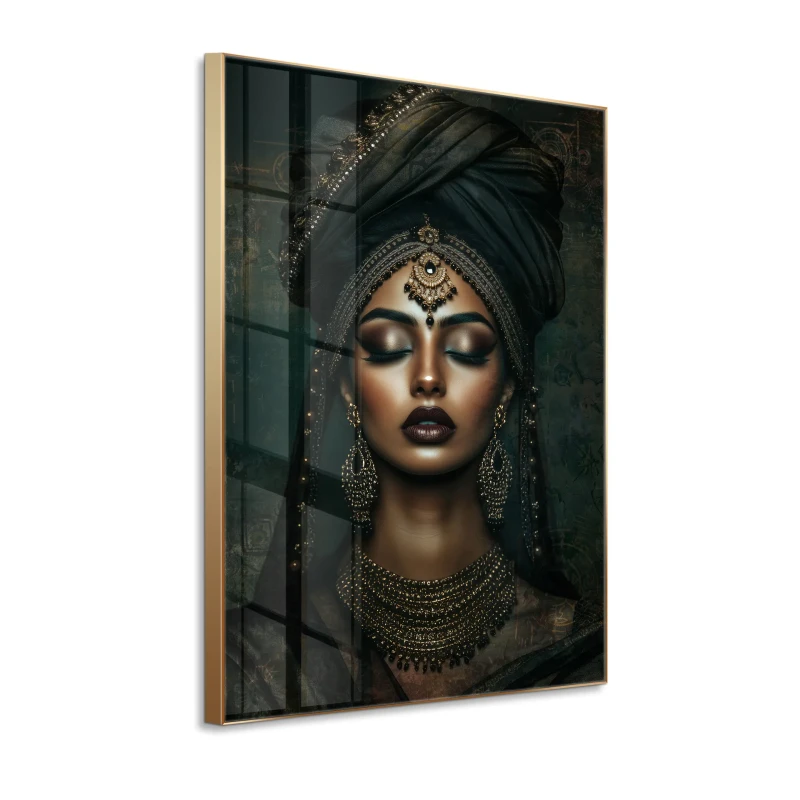 Black and gold glass wall art with ornate jewellery details