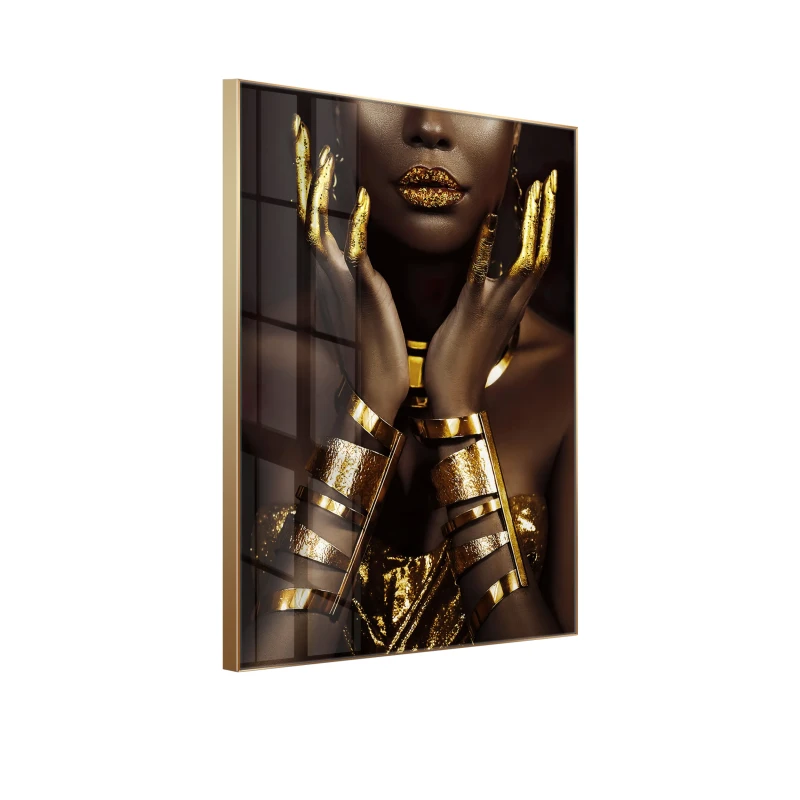Black and gold glass wall art with gold lips and hands