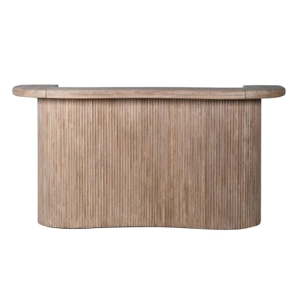 Large wooden home bar with a fluted curved front