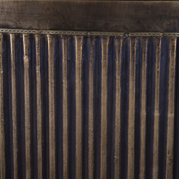 Curved home bar with an antique brass-effect finish