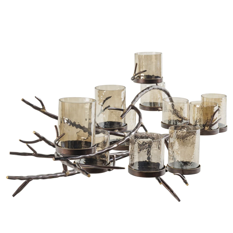 Sculptural bronze candle holder with eleven textured glass votives
