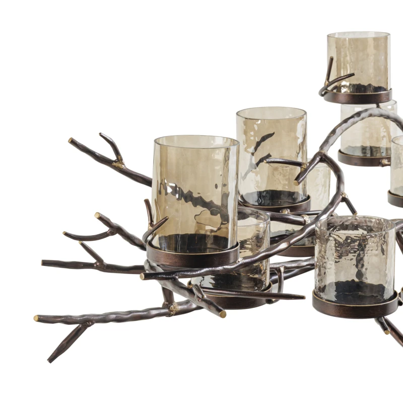 Sculptural bronze candle holder with eleven textured glass votives