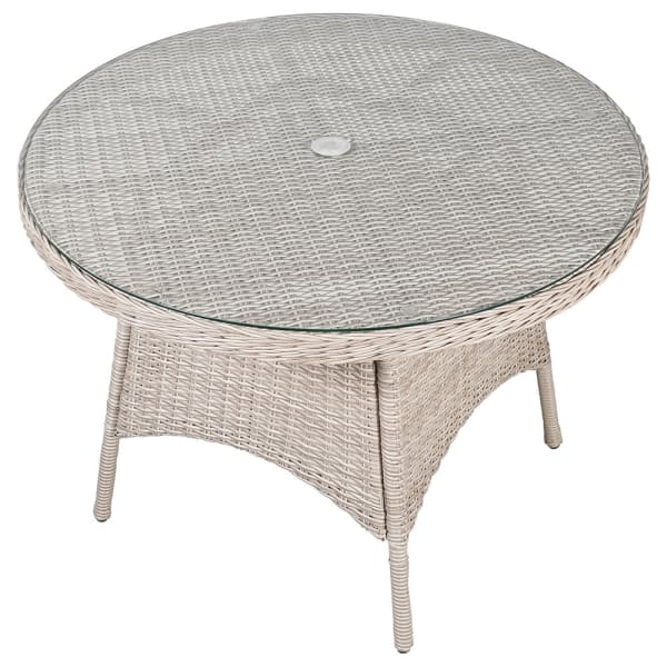 Rattan garden dining set for four with round glass-top table