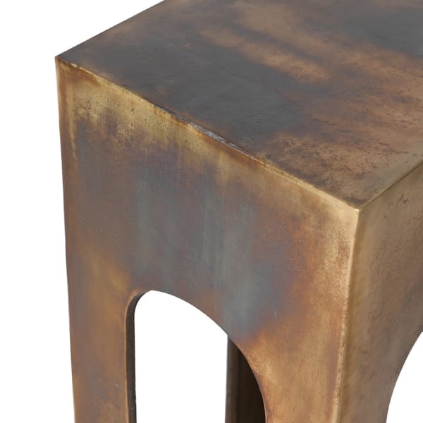 Tall gold display pedestal with architectural arched openings