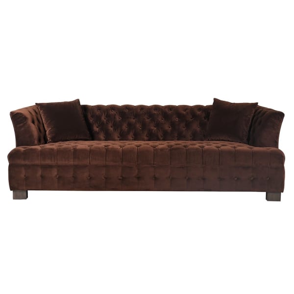 Large brown sofa with decorative buttons