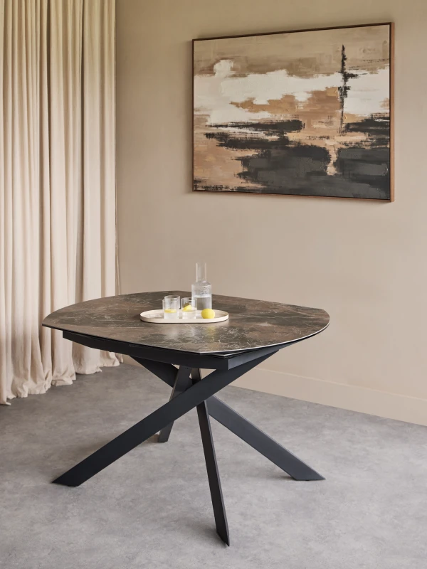 Thames 130cm ceramic dining table in a contemporary interior