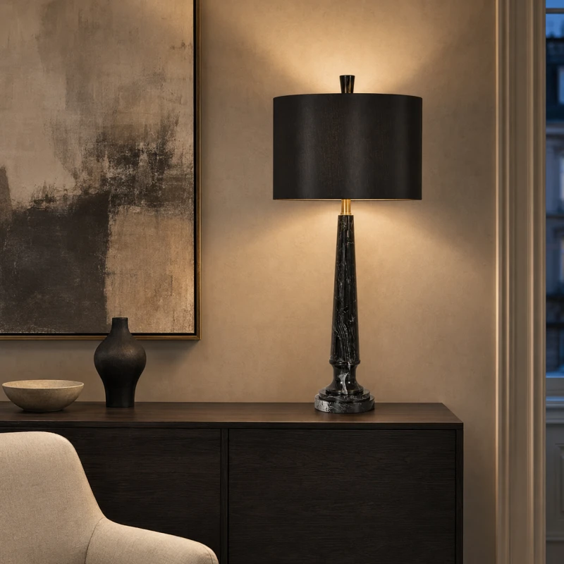 Large black table lamp with brass-finished details