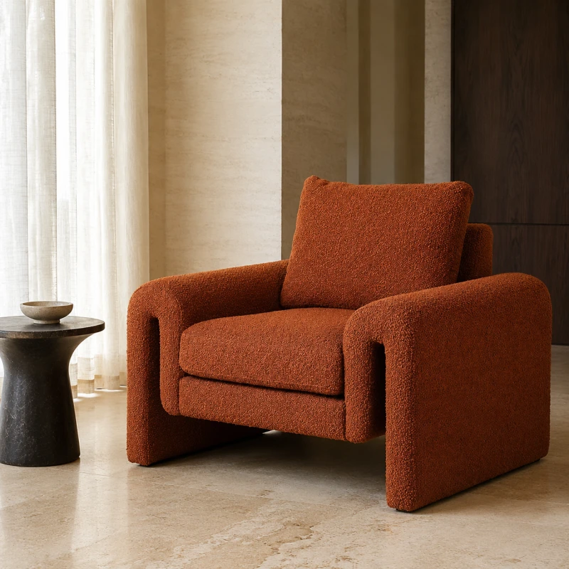 Cloud Rust bouclé armchair with broad upholstered arms