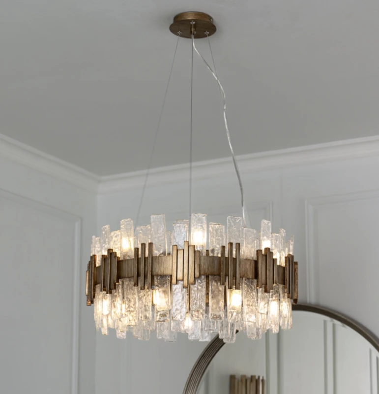 Antique gold chandelier with layered clear glass panels