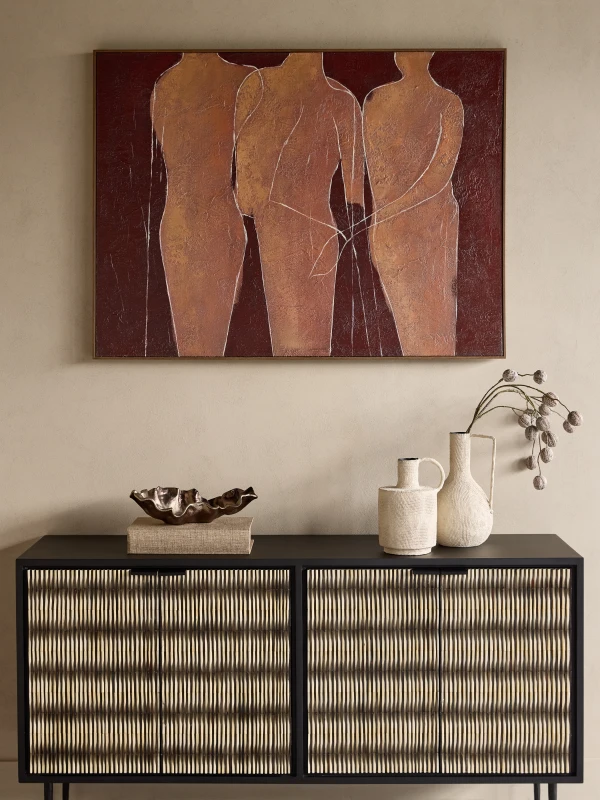 Terracotta and burgundy wall art with three figures