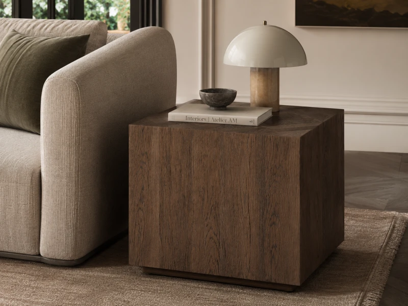 Dark wood square side table 55 × 55 cm beside a beige sofa