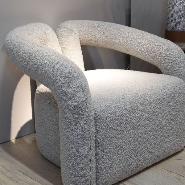 Low-profile grey armchair for the living room