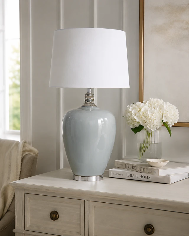 Blue-grey ceramic lamp with white linen shade