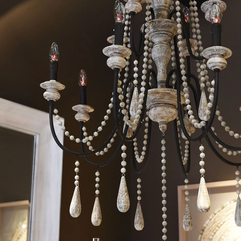 Large iron chandelier with wooden beads