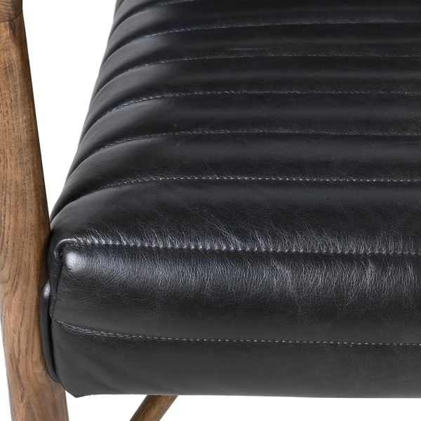 Mid-century modern leather armchair for a living room