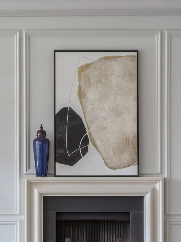 Beige black and gold abstract wall art in a black frame