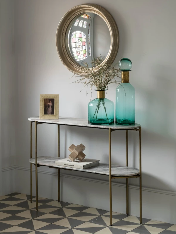 Pale console table with two marble shelves