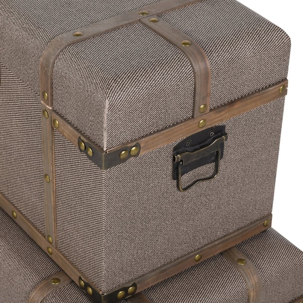 Handmade linen storage trunks with iron details
