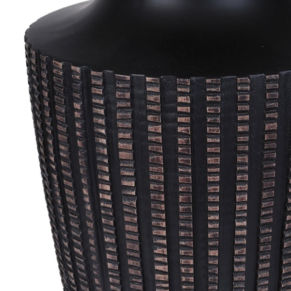 Hand-finished black base of the Junio Table Lamp showing brown textured detailing