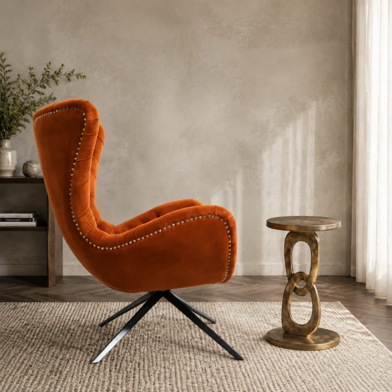 Rust-orange Boscobel armchair with black metal swivel base