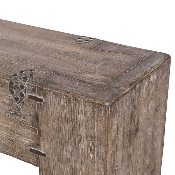 Close-up of reclaimed pine grain and aged metal fittings on the Tuscany console table