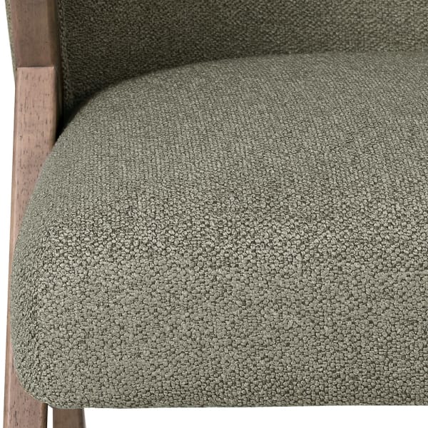 Textured pistachio-green upholstery on the Belgrave dining chair