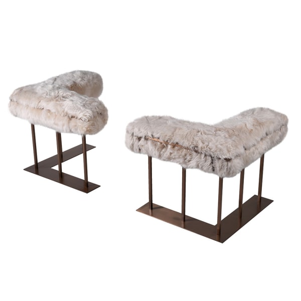 Pair of almond sheepskin corner fire fenders with metal frames
