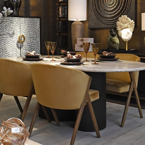 Belgrave Gold velvet dining chairs styled around dining table