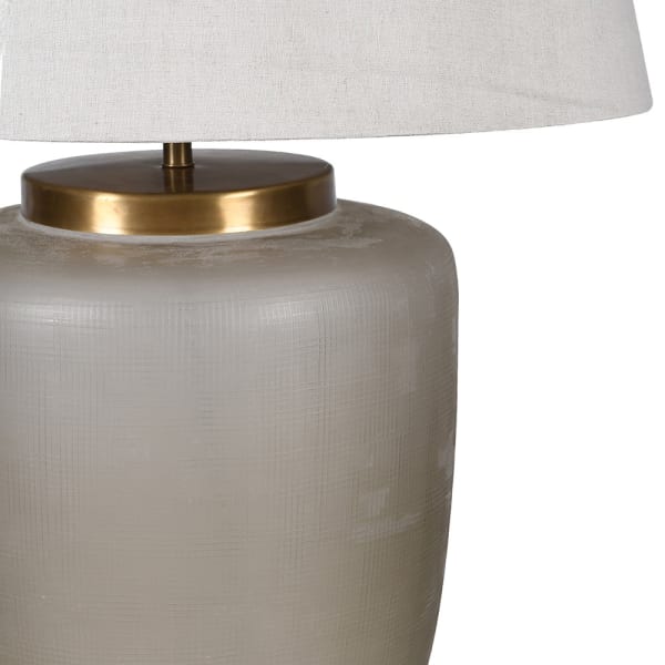 Close-up of textured smoked glass and brass detailing on Fritzovia M table lamp