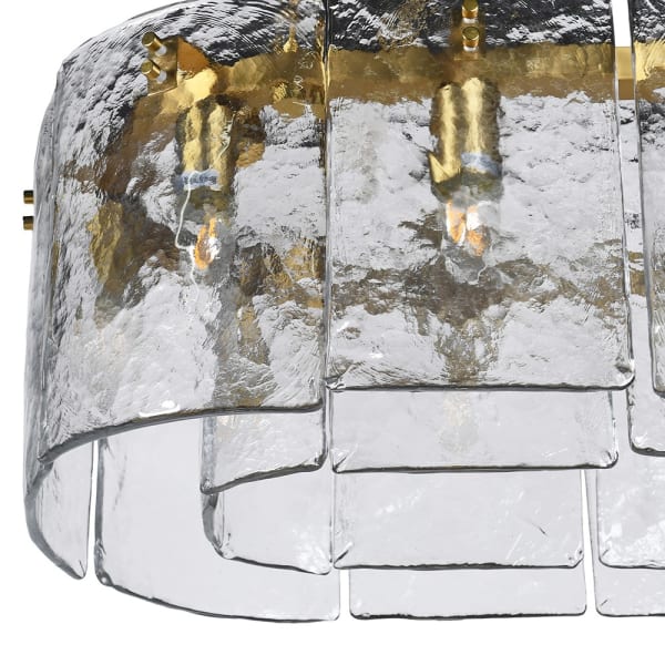 Close-up of textured glass panels and metal fittings on Halo chandelier