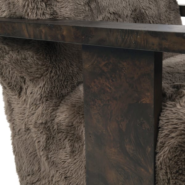 Close-up of dark burl veneer armrest on Portobello swivel armchair