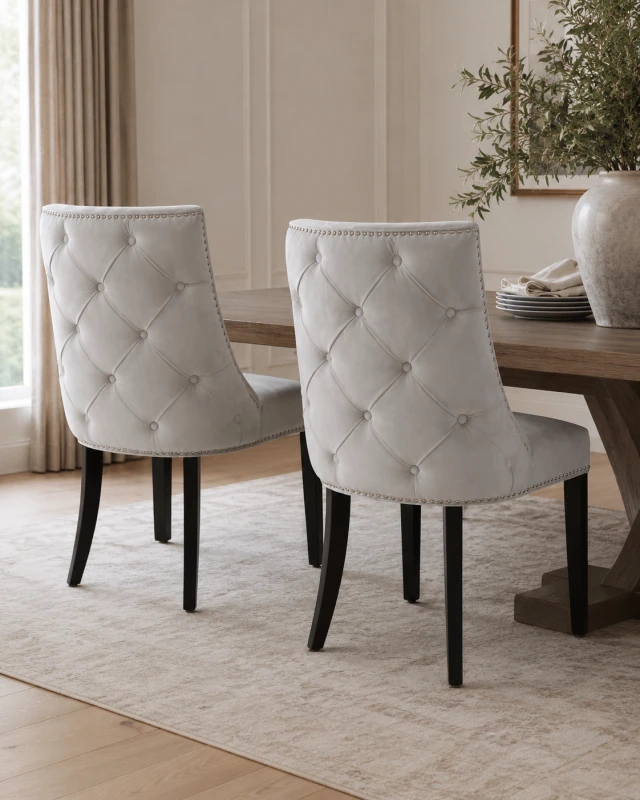 Savile Grey dining chair with light grey upholstery and black wooden legs