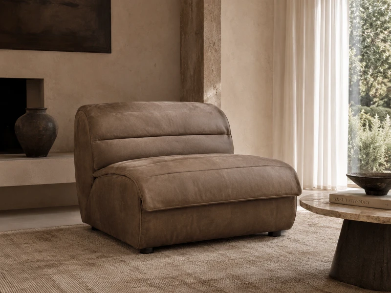 Holland Park nubuck leather lounge chair in a luxury neutral living room