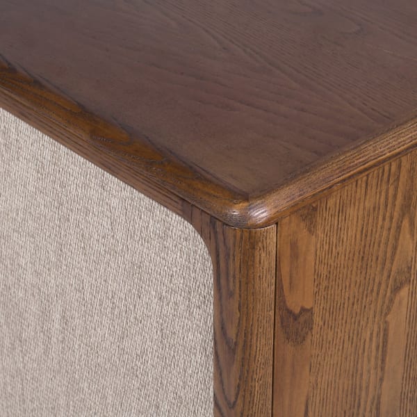 Enford ash wood sideboard detail showing timber grain and linen panel