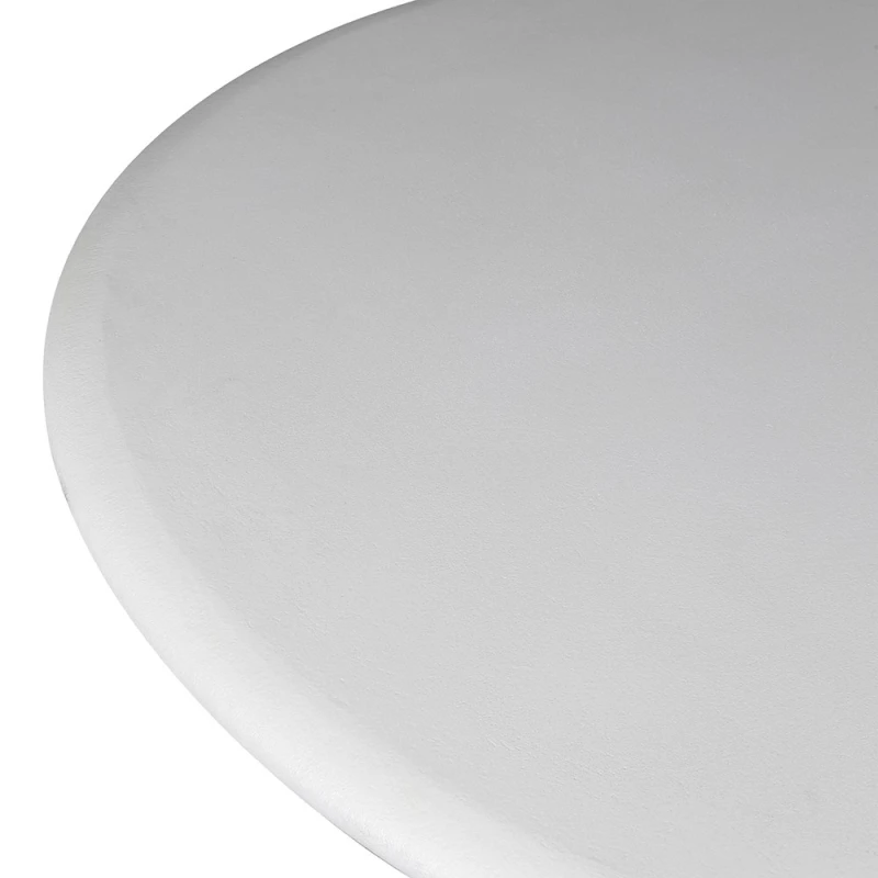 Kew dining table detail showing smooth white round tabletop