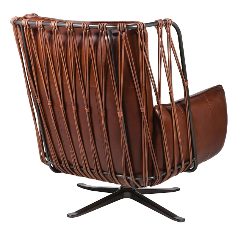 Decorative laced back and iron frame on Chelsea leather armchair