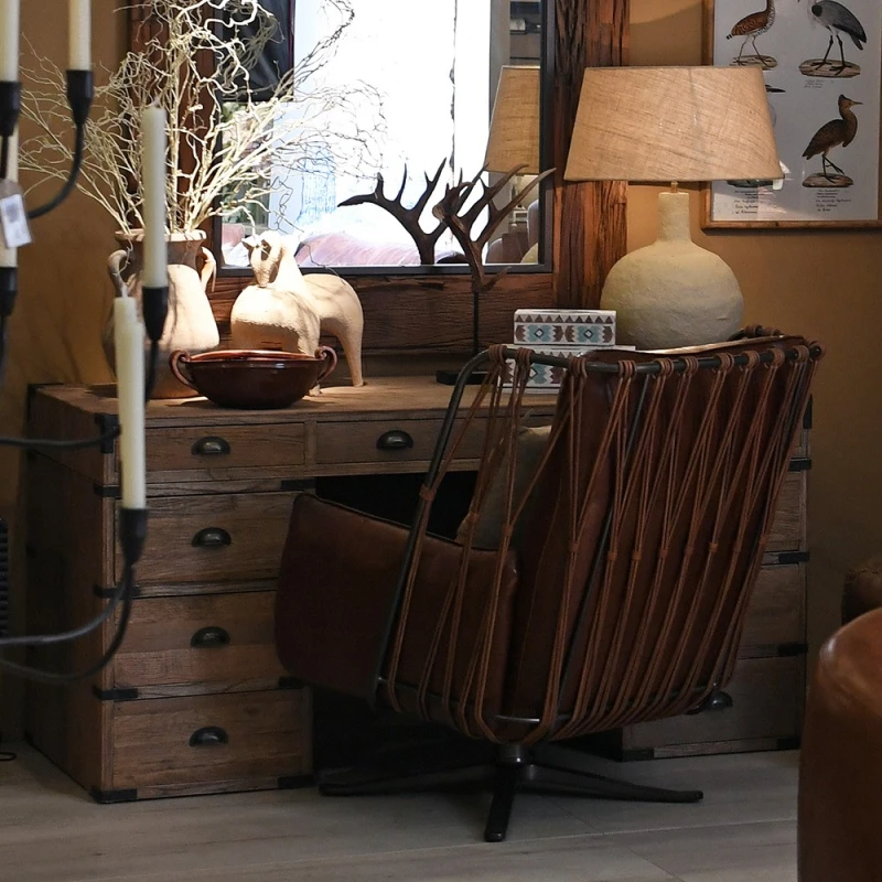 Chelsea brown leather armchair in an elegant study interior