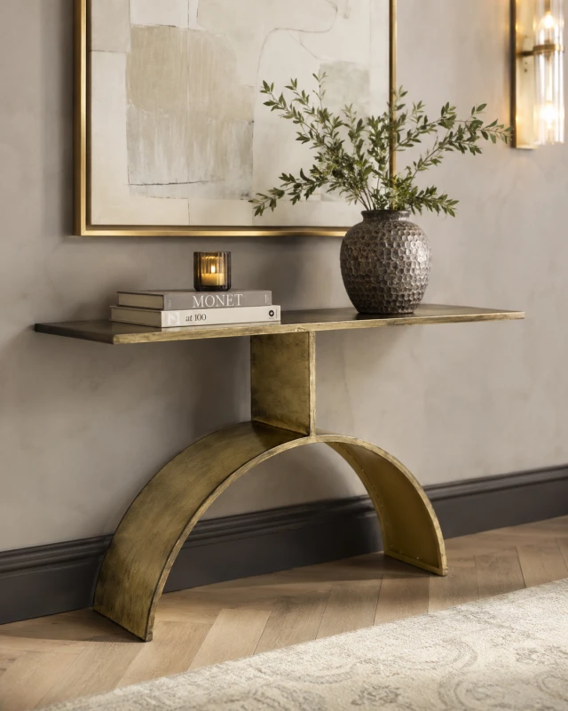 Antique gold iron console table with curved base