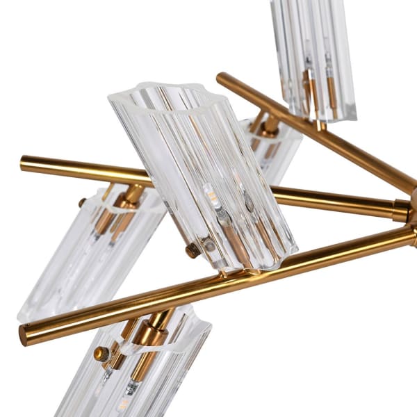 Close-up of Aurelia glass chandelier with gold-toned metal frame