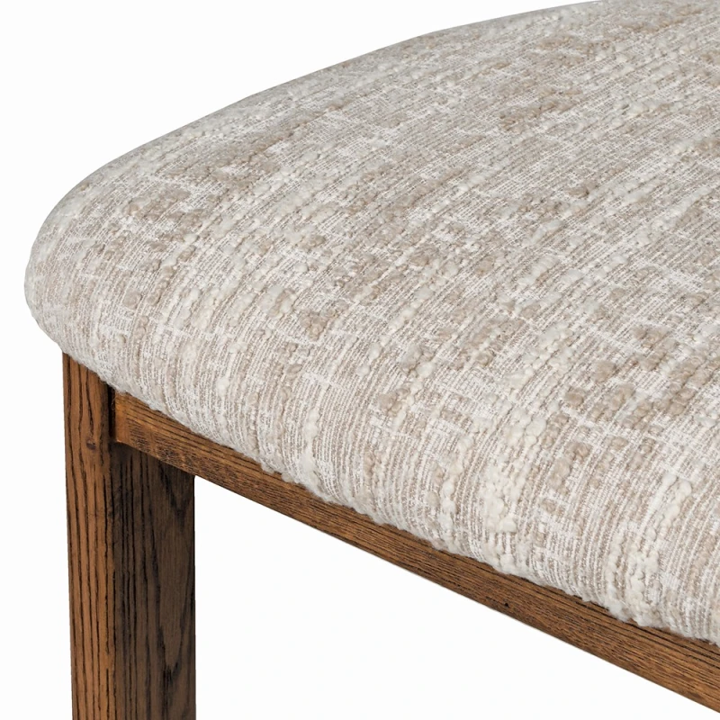 Close-up of Holland Park cream bouclé dining chair upholstery