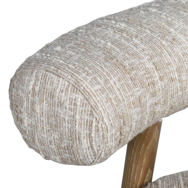 Close-up of Belsize Bouclé Armchair curved upholstered back