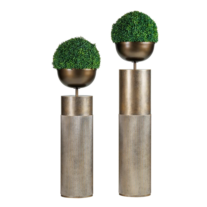 Primrose tall gold planter styled with decorative greenery