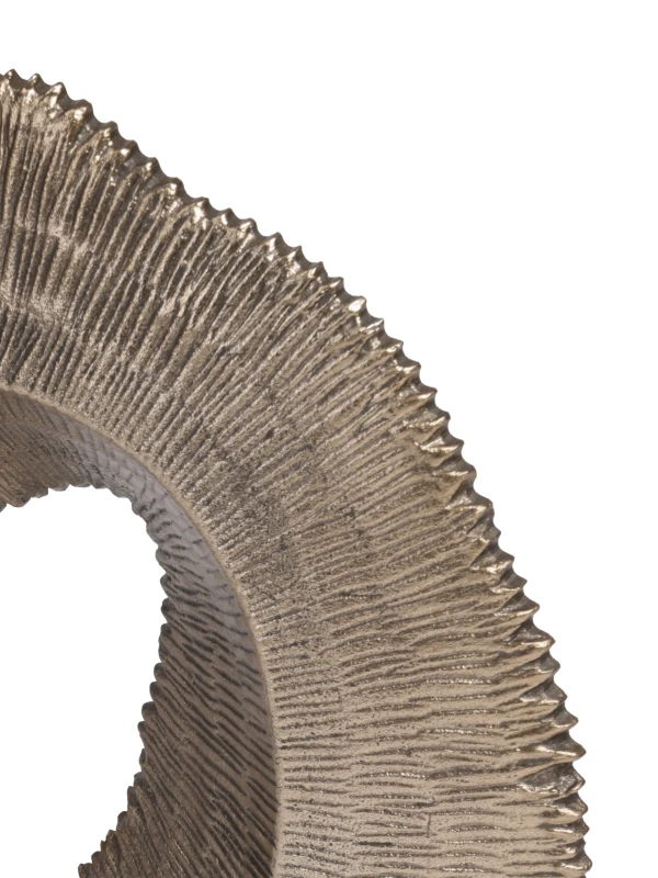 Deeply ridged texture detail on Golden gold sculpture