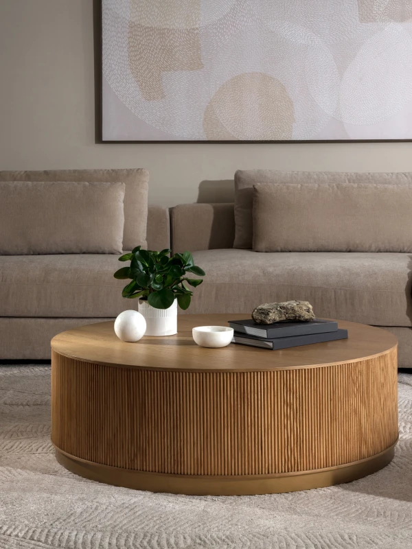 Chiswick round oak coffee table styled in a neutral living room
