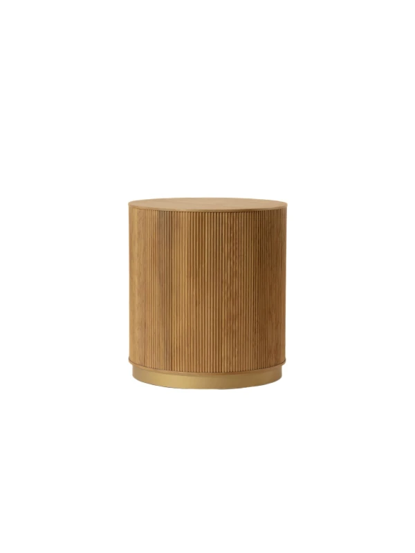 Chiswick oak side table styled beside a cream armchair
